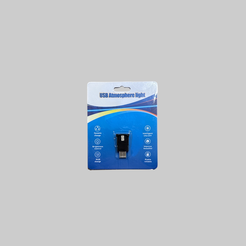 USB dongle som bruges til LED lys. Den er pakket ind i en blå og hvid pakke.