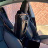 Armlæn med opklappet låg og opbevaringsrum i Tesla Model 3 og Model Y