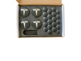 Aero Wheel Cap Kit til Tesla – navkapsler med hvidt Tesla-logo på sort og boltcovers i æske