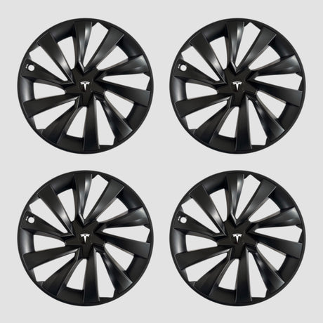 Fire sorte MV Spiral hjulkapsler med Tesla logo til Model Y 2025.