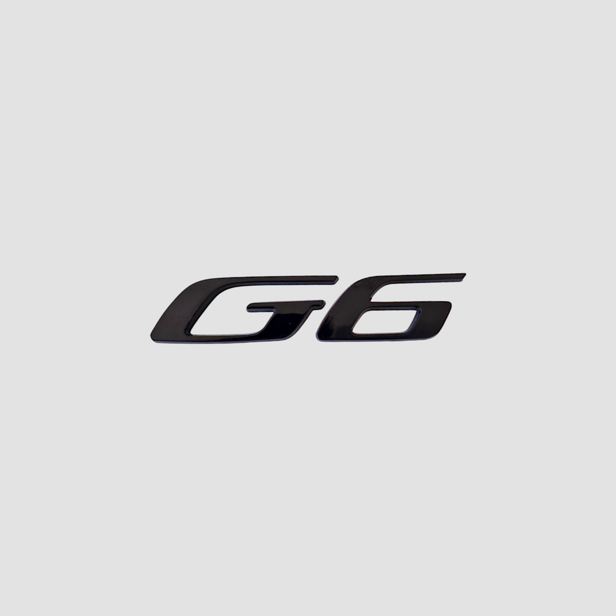 G6-emblem i blank sort til XPENG G6