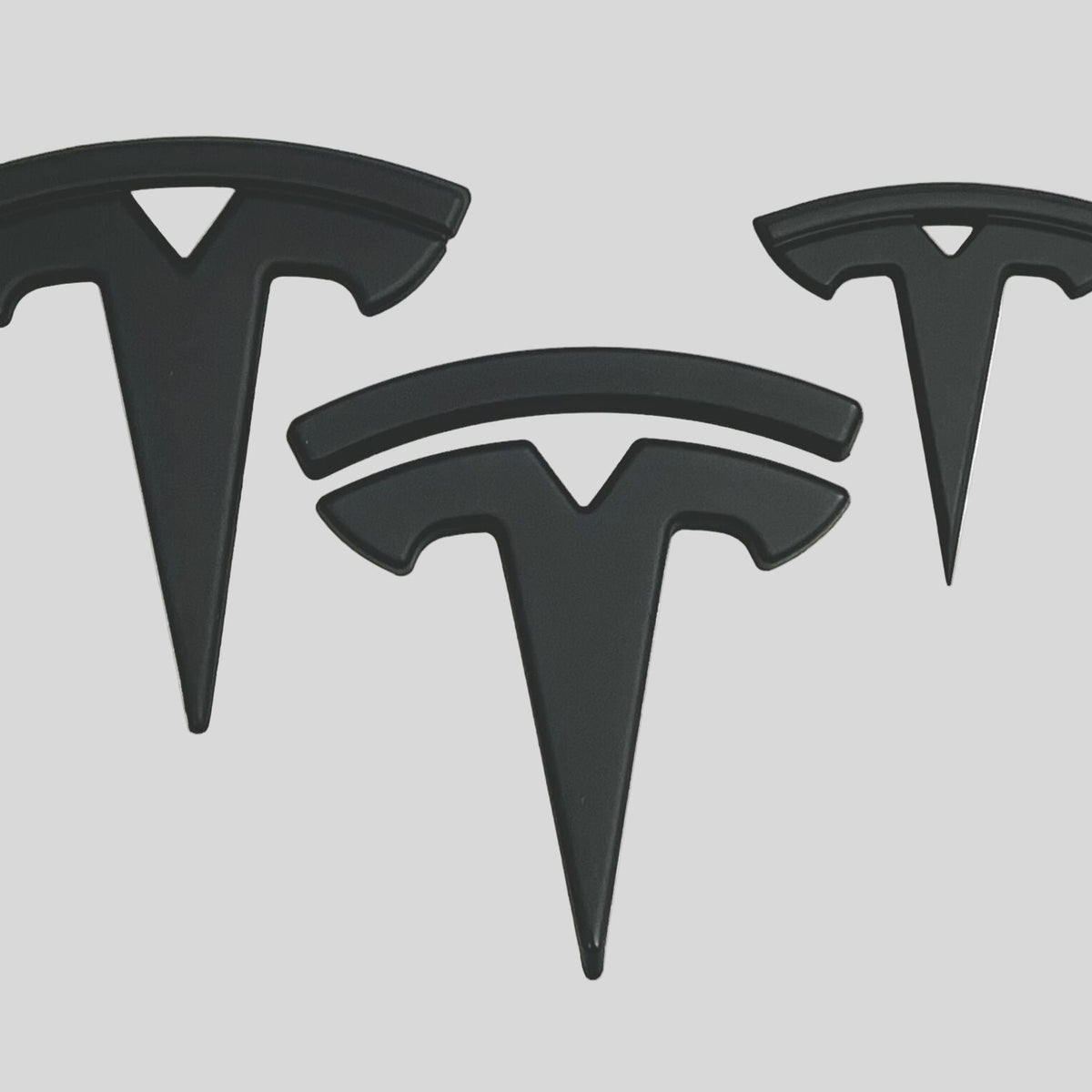 Emblemer i mat sort til Tesla Model X