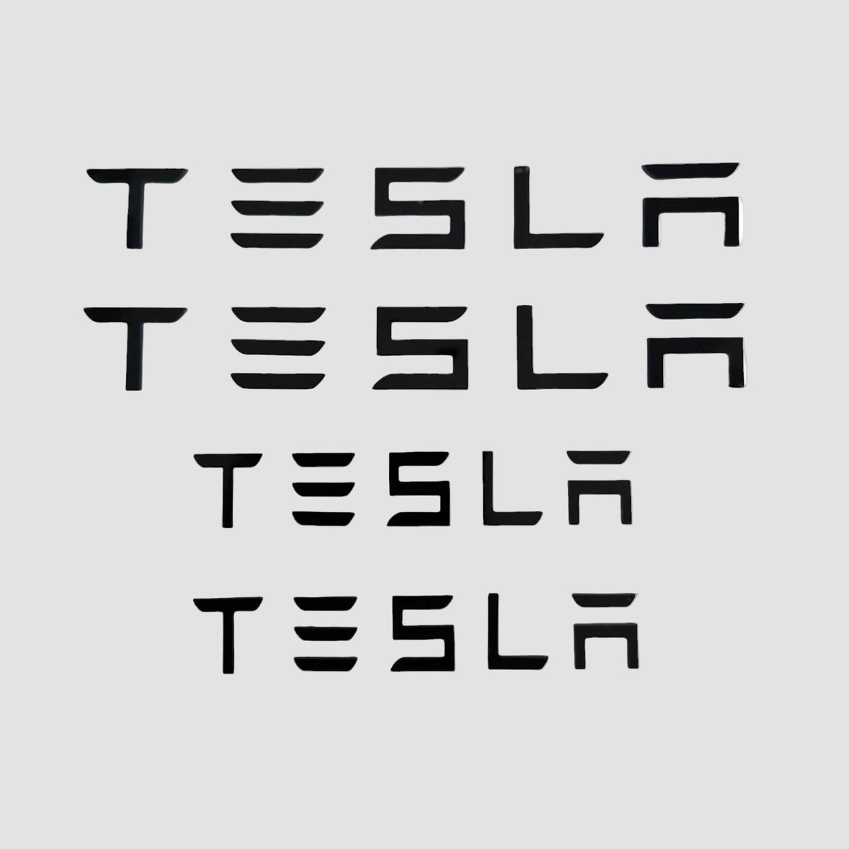 Tesla bogstaver som kan bruges i stedte for logo på bilen 